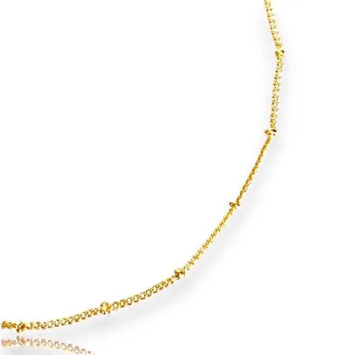 Aurelia Satellite Anklet styled gold anklet with delicate details