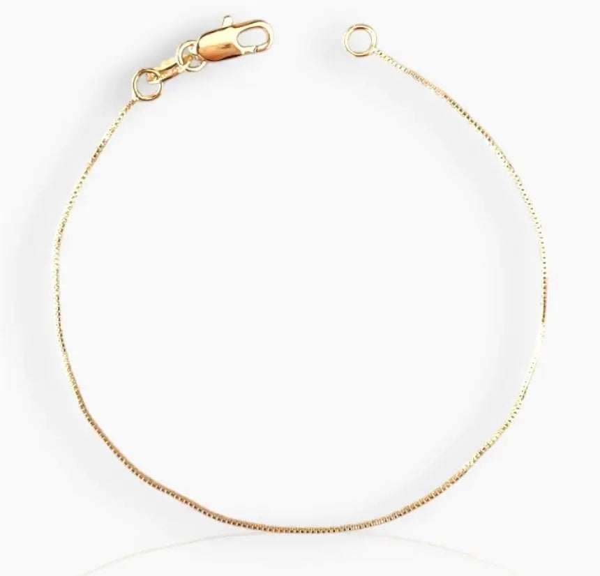gold-filled box chain bracelet on white background
