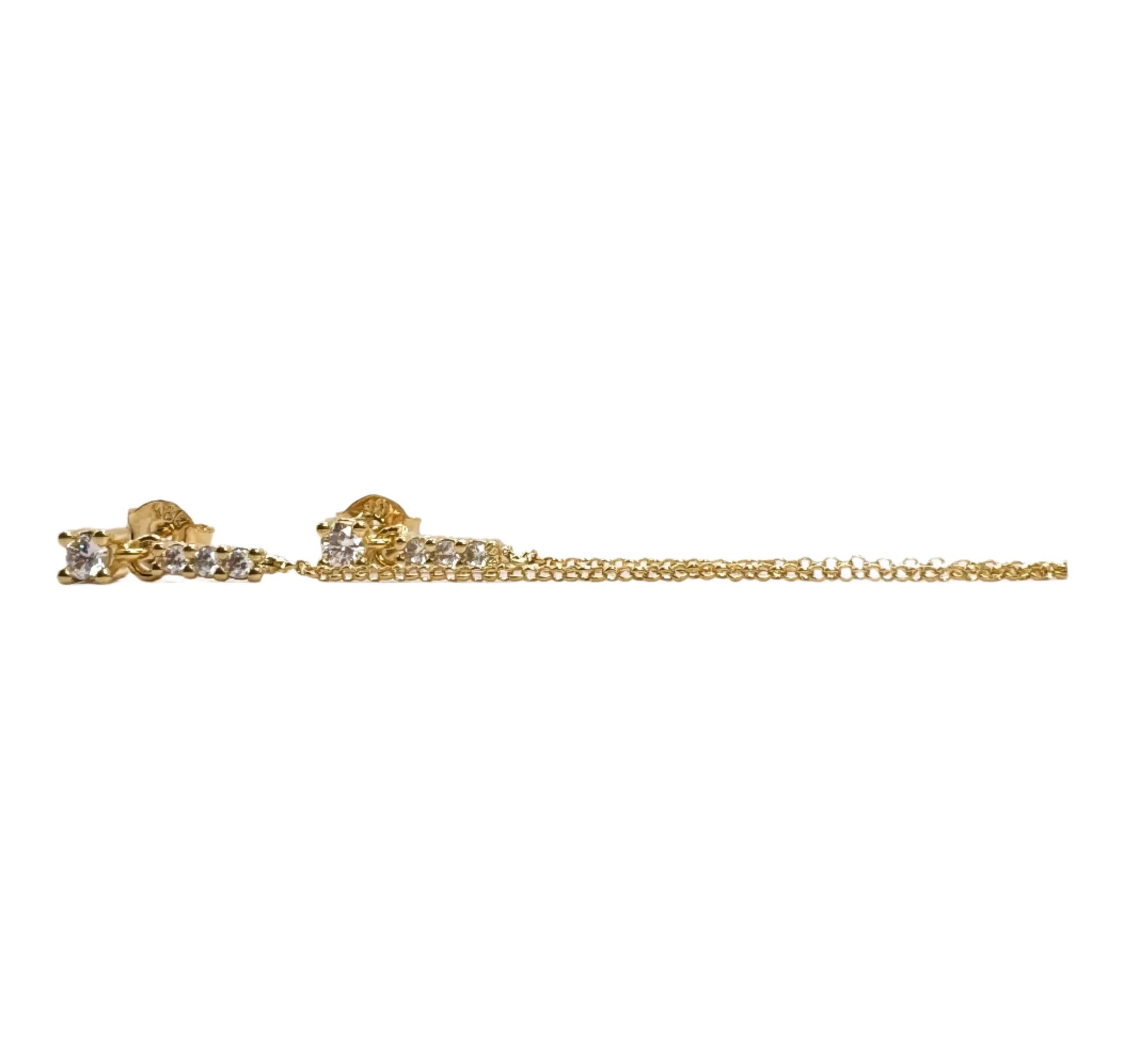 A pair of gold-colored Aria Chain Double Stud earrings with a delicate chain connecting two diamond stud earrings, displayed against a white background.