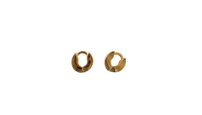 Gold hoop earrings on a white background