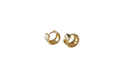 Gold hoop earrings on a white background