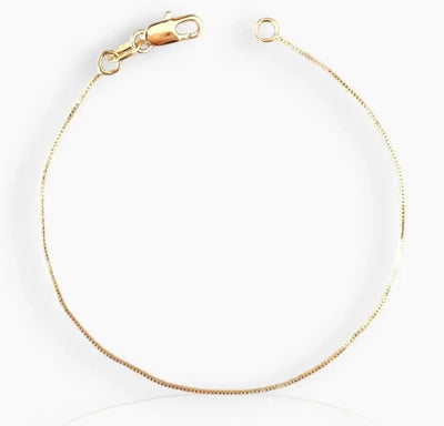 gold-filled box chain bracelet on white background 