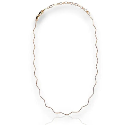 A gold-filled chain necklace with a zigzag design, displayed against a white background.